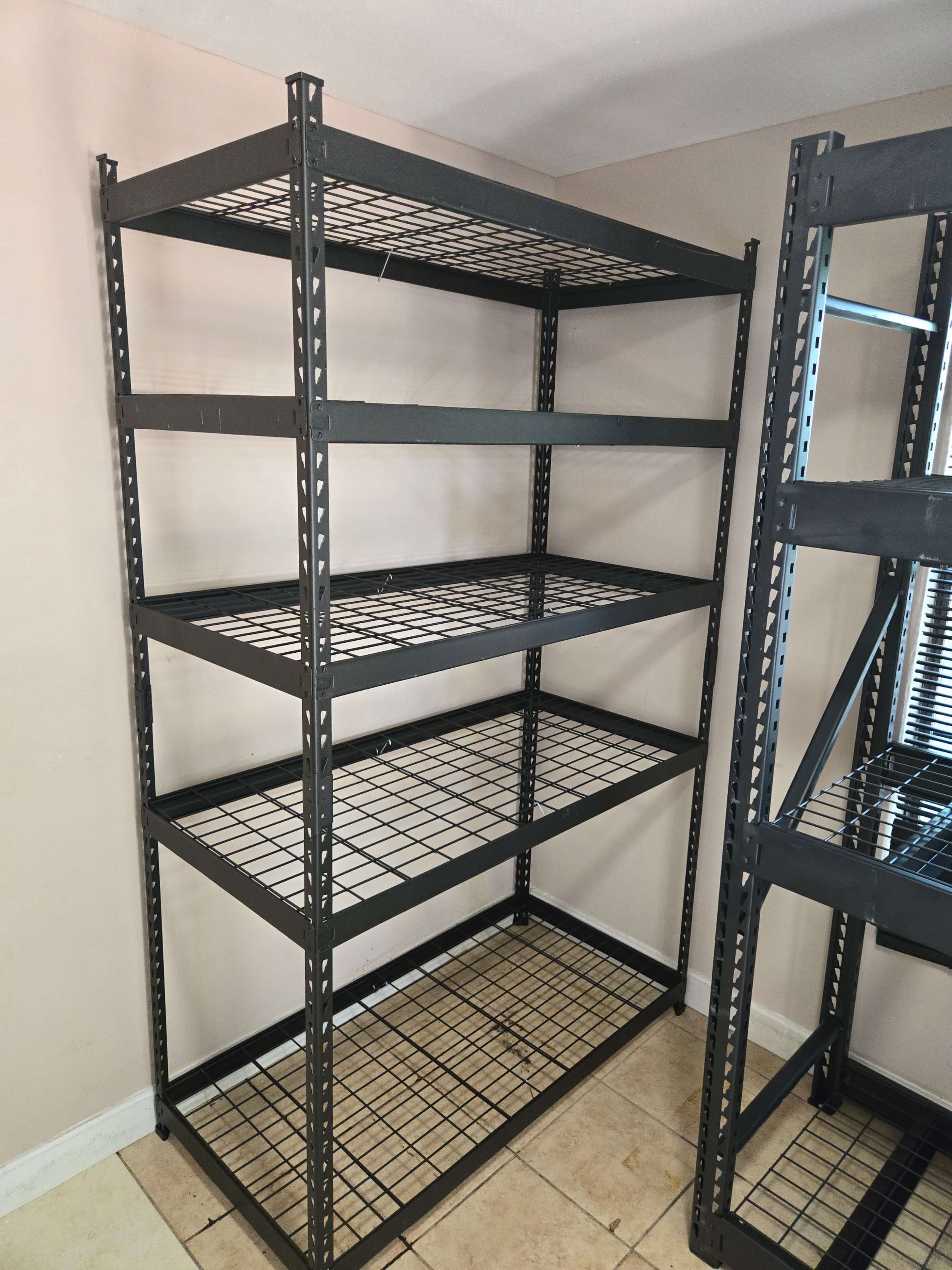 A completed Husky 5-shelf heavy-duty steel shelving unit assembled by Mount & Fix