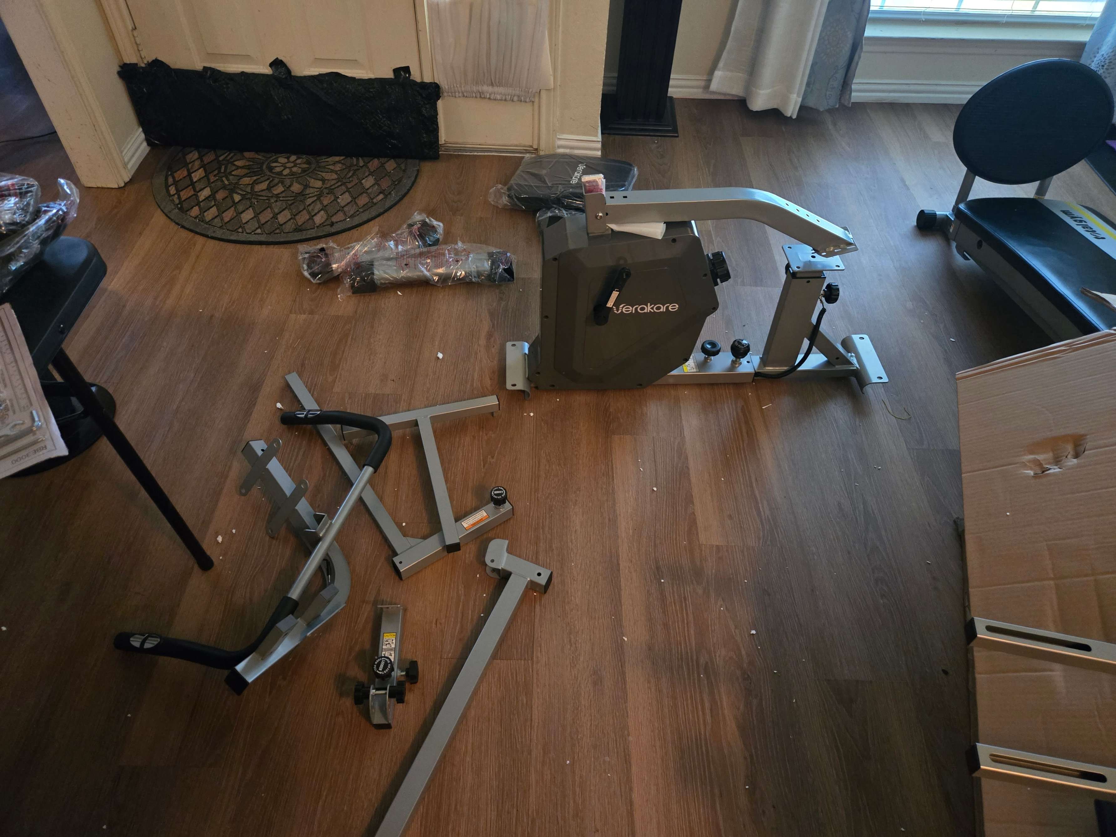 Home gym equipment parts ready for setup by Mount & Fix in Dallas