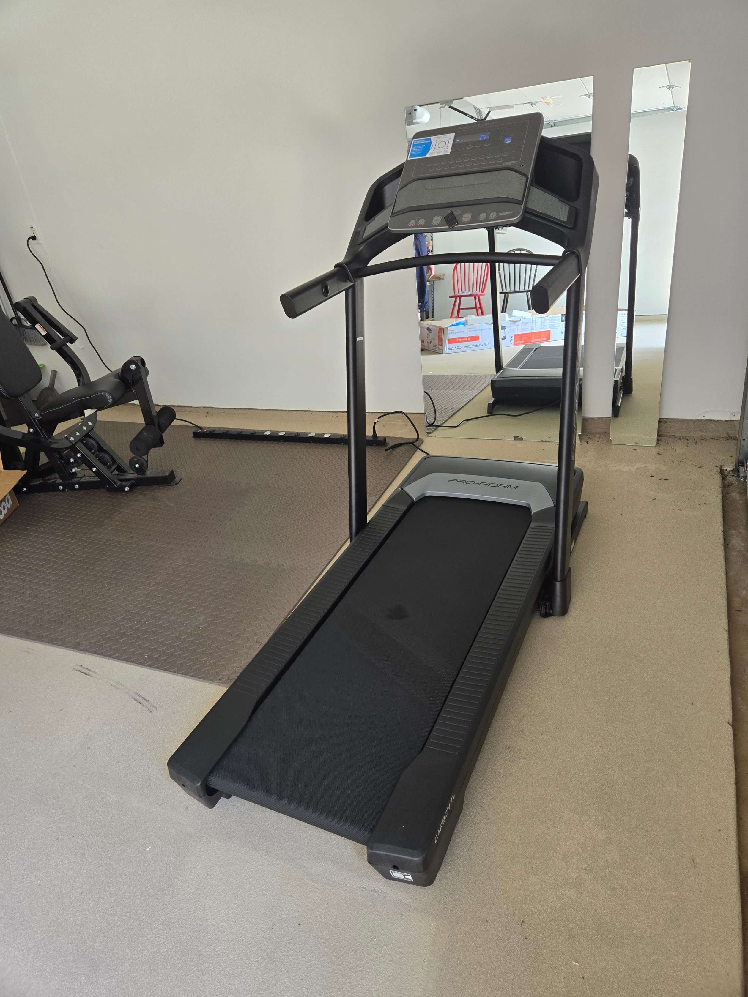 Treadmill console assembly in progress with expert service from Mount & Fix