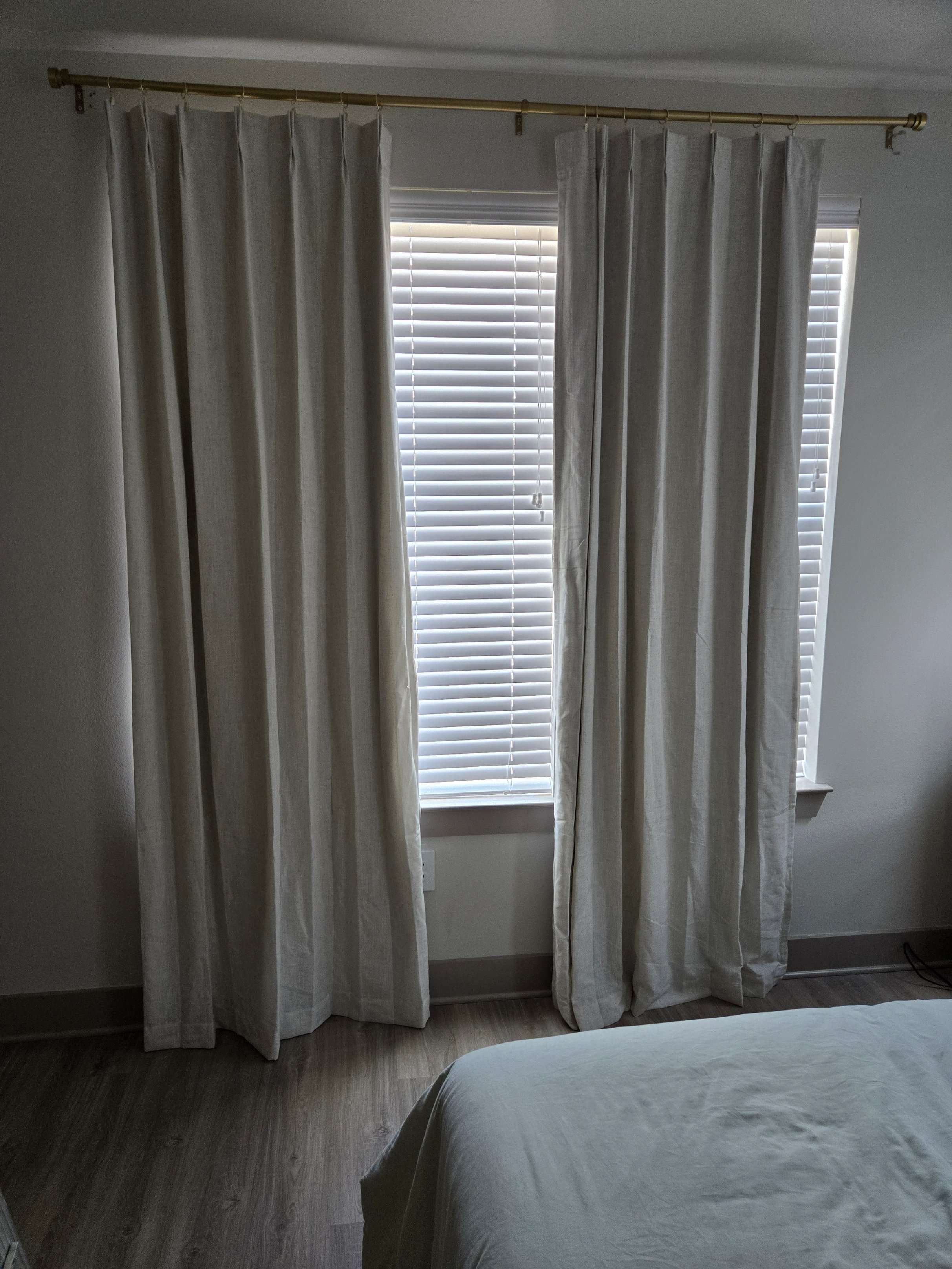 Full view of Pinch Pleat Blackout Curtains, professionally installed by Mount & Fix, DFW