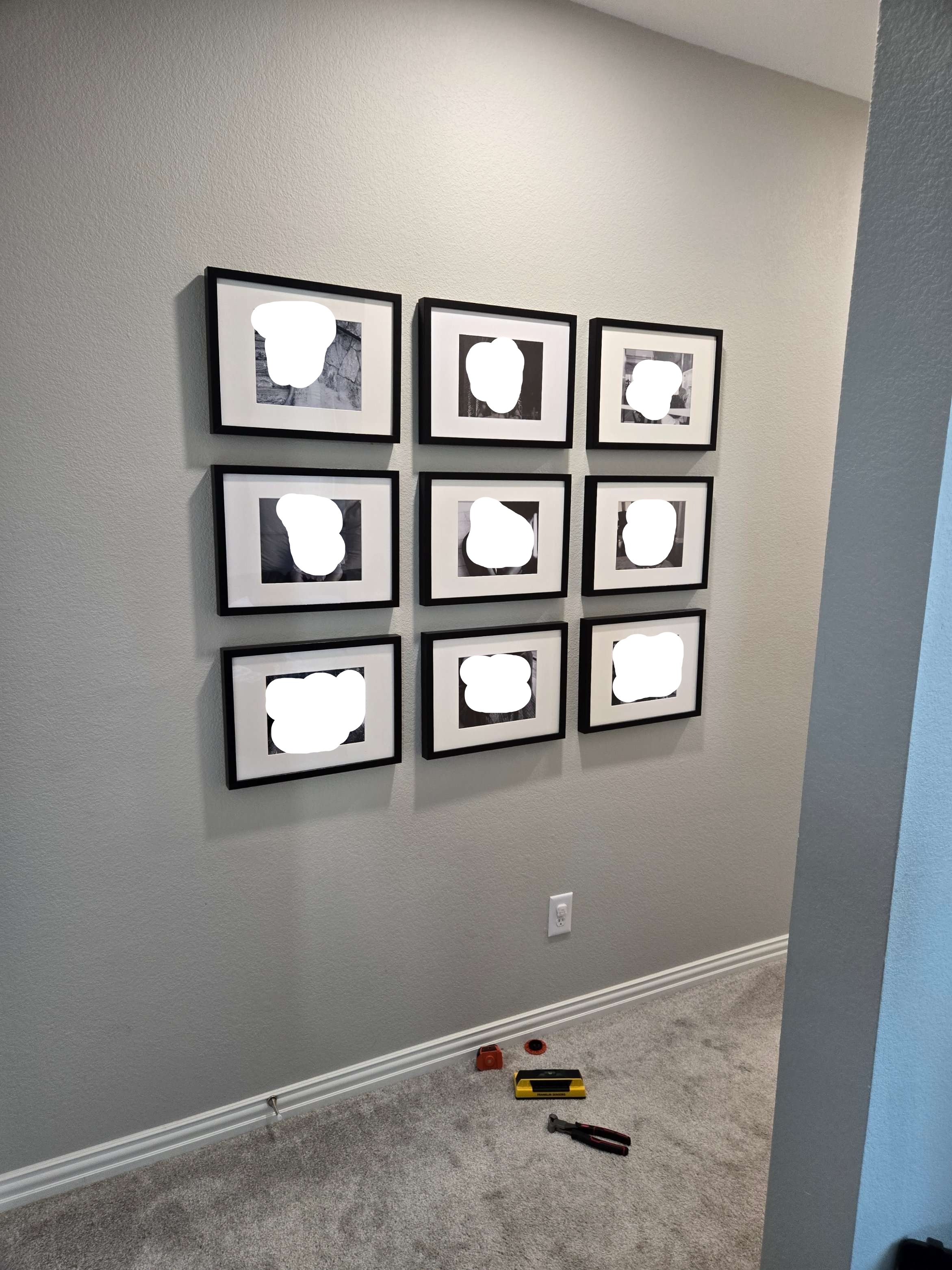 Framed gallery expertly hung on the wall by Mount & Fix, Fort Worth