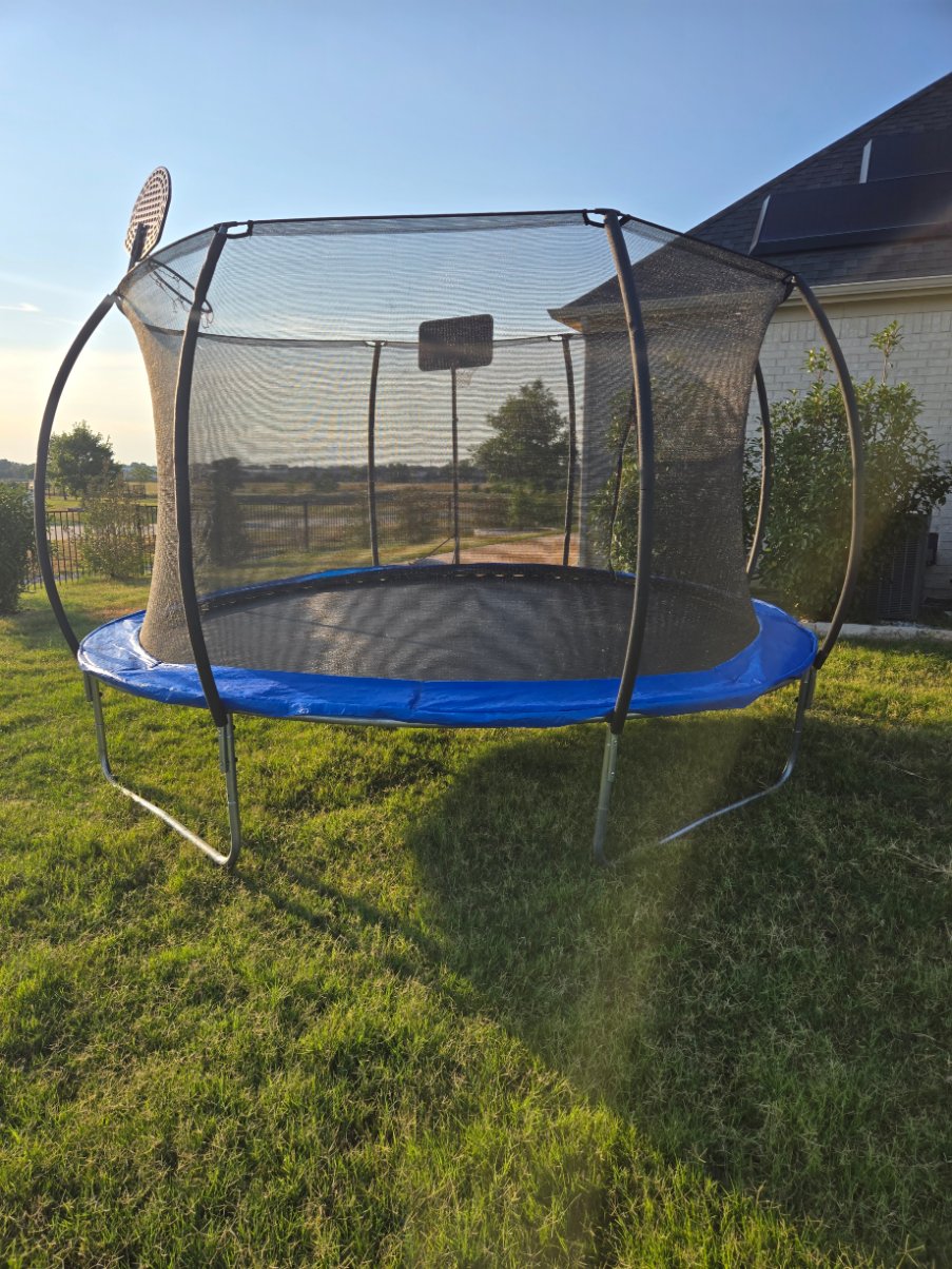 Fully assembled backyard trampoline by Mount & Fix, Dallas trampoline assembly