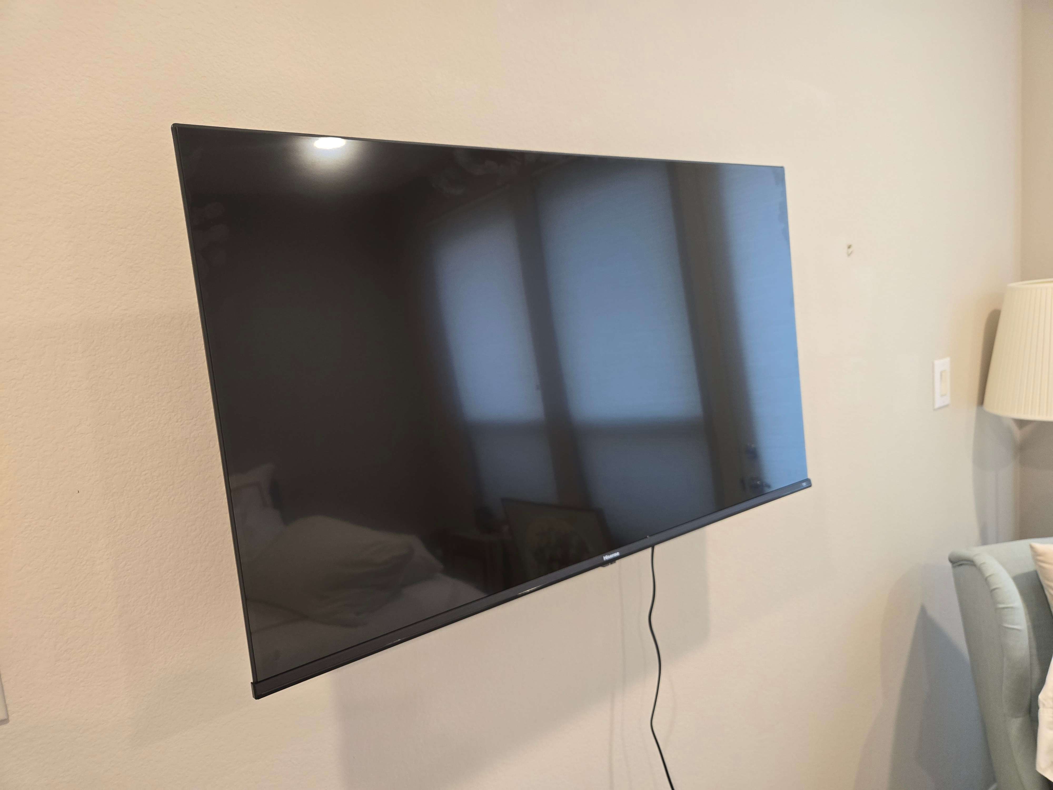 Hisense 43 Inch 4K UHD Smart TV professionally mounted by Mount & Fix, DFW