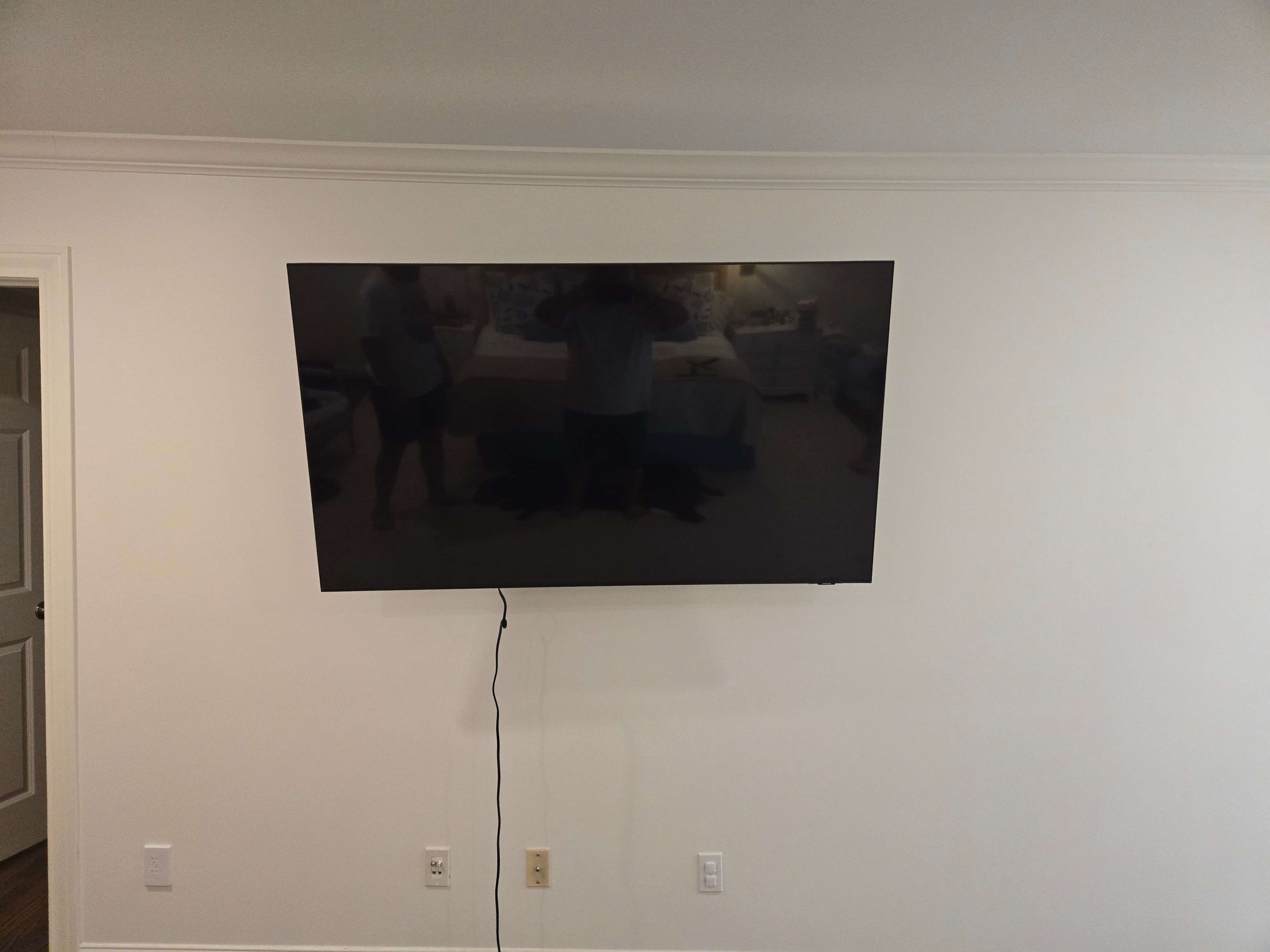 LG OLED C2 65 inch TV wall-mounted by Mount & Fix in Dallas