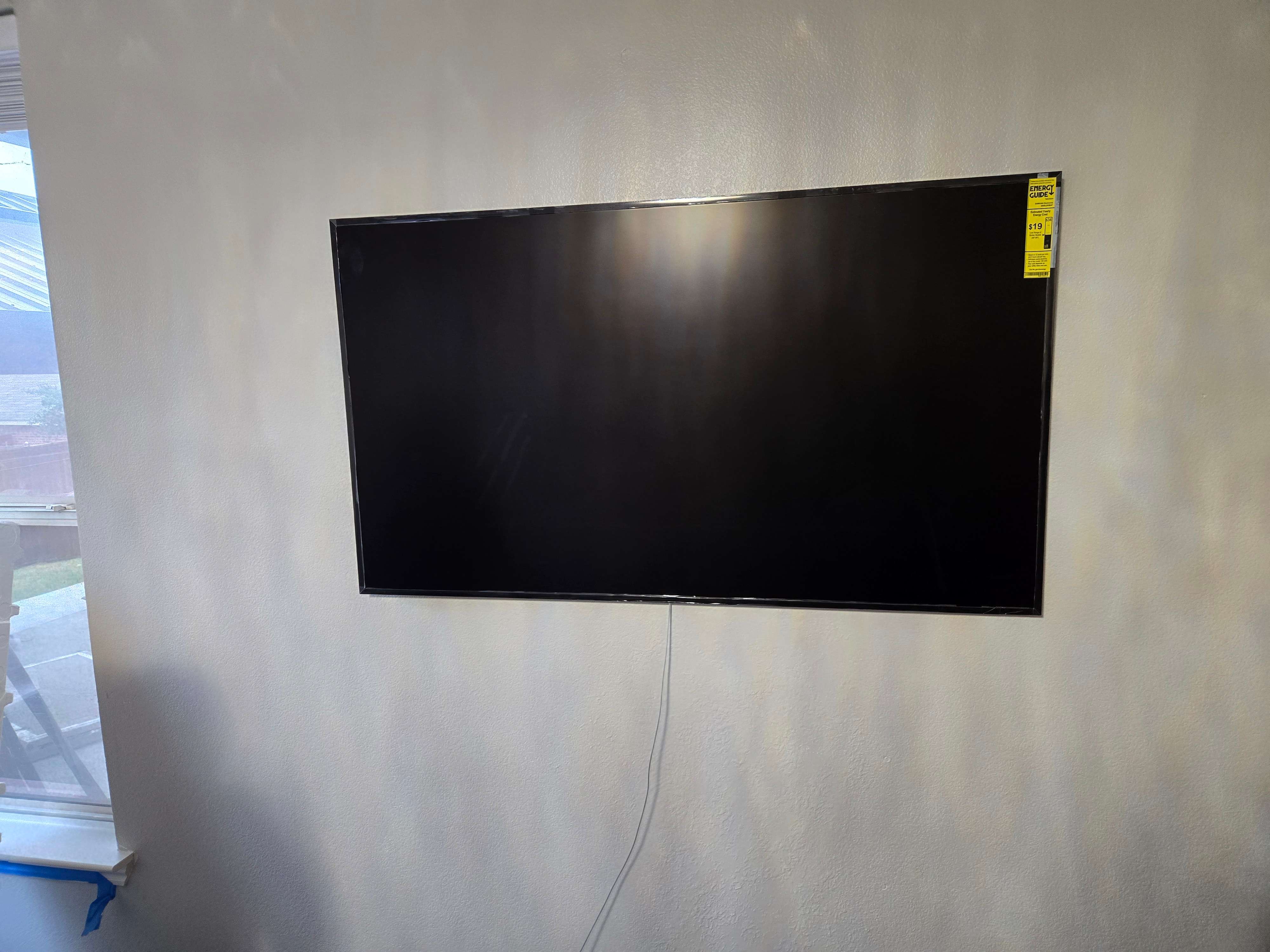 Flawless view of Samsung The Frame TV wall-mounted by Mount & Fix in Dallas